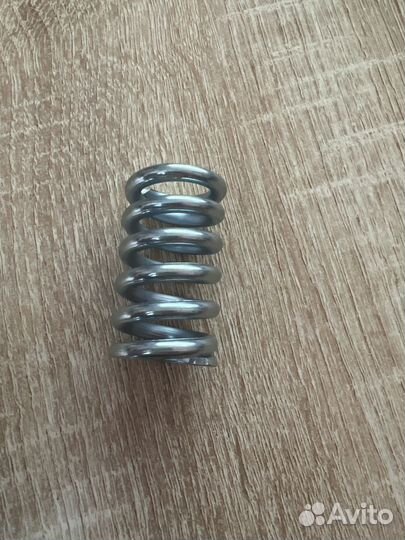Пружина крепления глушителя
