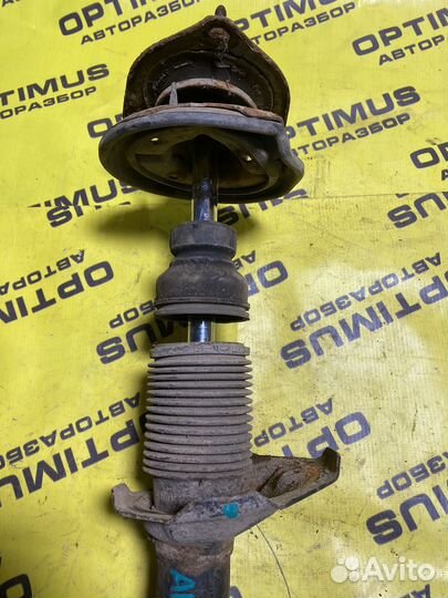 Стойка амортизатора передняя левая Hyundai Accent