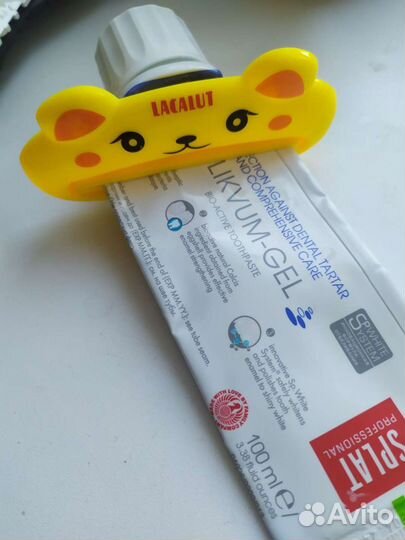 Выдавливатель для тюбиков зубной пасты или крема