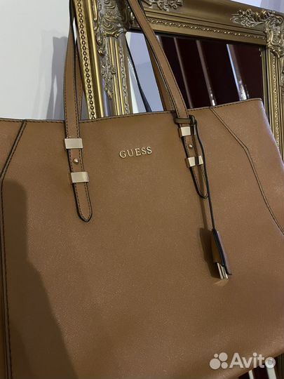 Сумку guess коричневая большая с ручками