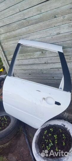 Задняя левая дверь Лада Гранта