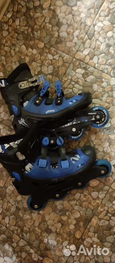 Роликовые коньки