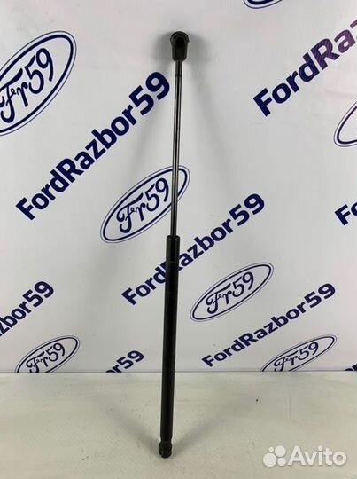 Амортизатор крышки багажника задний правый Ford