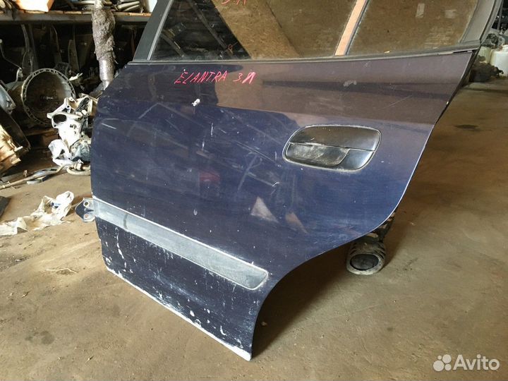 Дверь задняя левая (Hyundai Elantra)