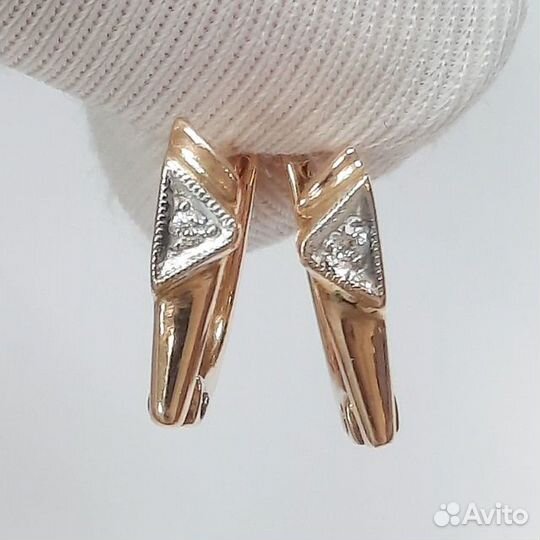 Золотые серьги с камнем