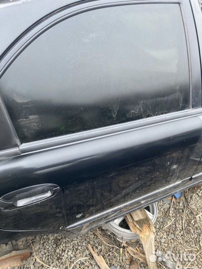 Задняя правая дверь kia spectra