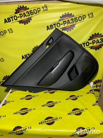 Обшивка боковой двери задняя левая Kia Sportage QL