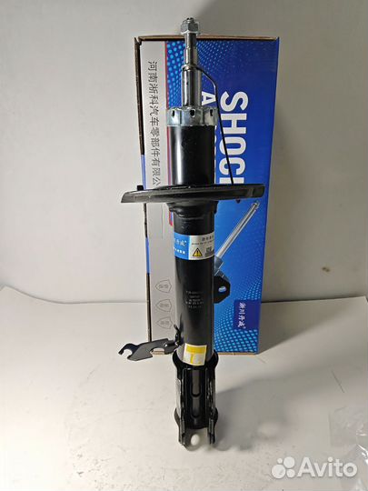 Амортизатор передний левый Chery