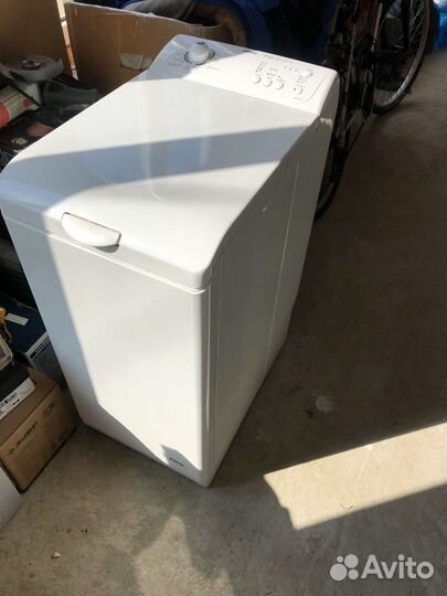 Стиральная машинка с вертикальной загрузкой