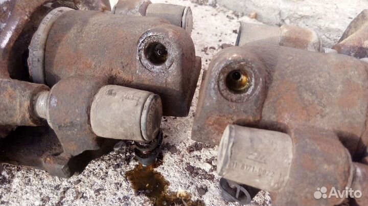 Суппорт тормозной передний - задний BMW E34