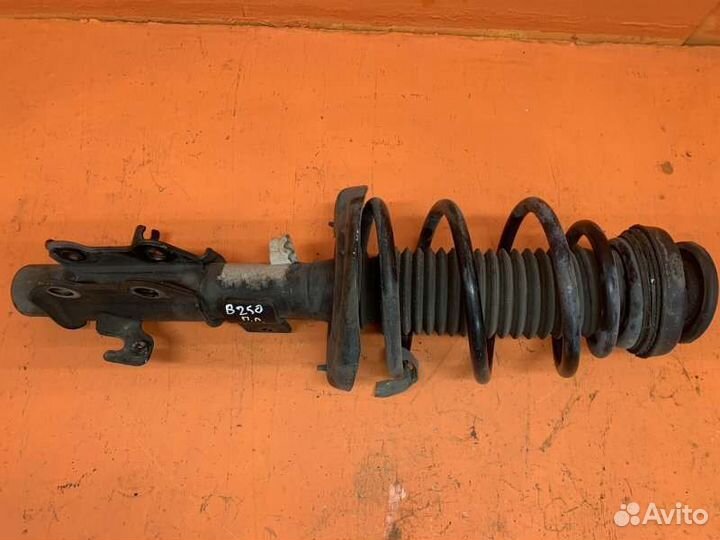 Стойка амортизатора передняя левая Chevrolet