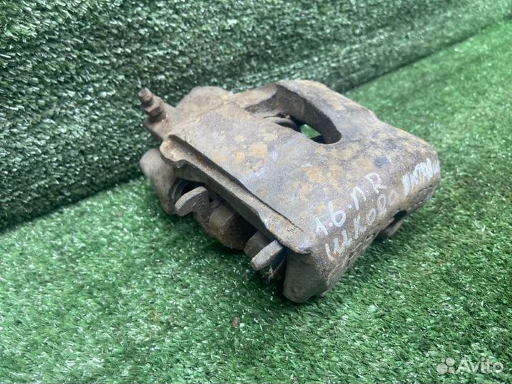 Тормозной суппорт передний правый Skoda Octavia 1