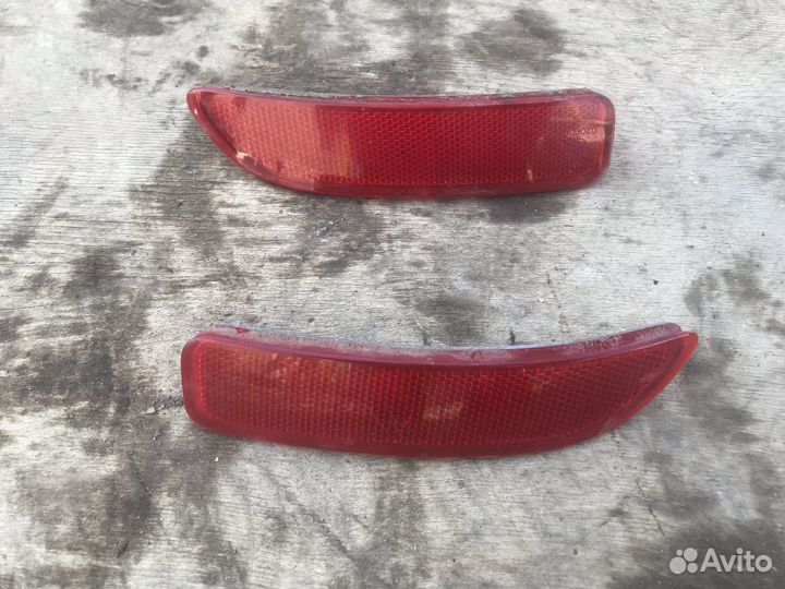 Катафот заднего бампера Renault Logan