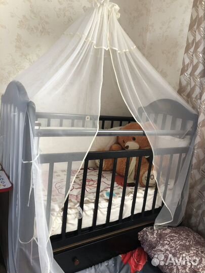 Детская кровать-маятник