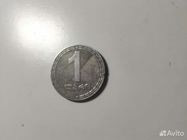 Монету 2006 года