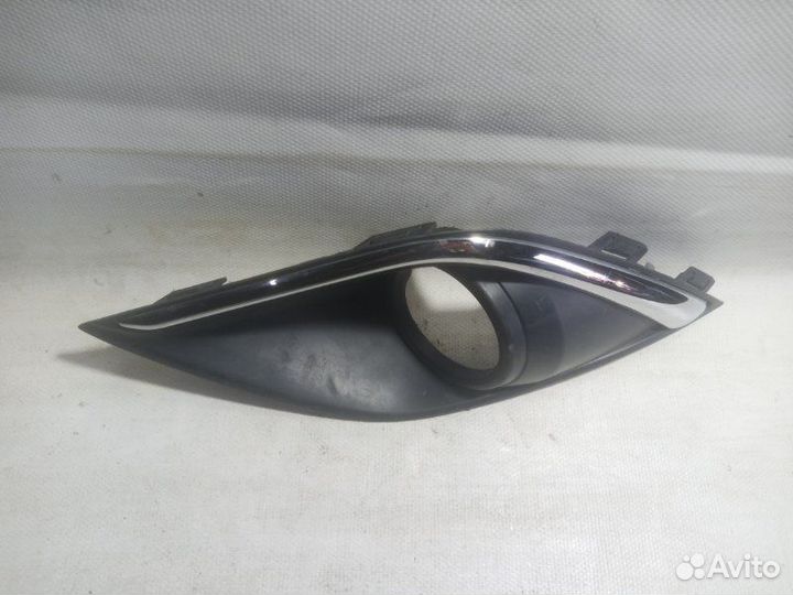 Накладка на туманку передняя левая Mitsubishi