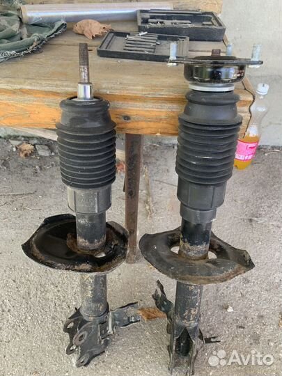 Стойки передние nissan sanny