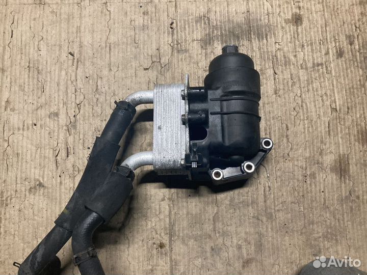 Корпус масляного фильтра Кия, Хендай 2.2л. D4HB