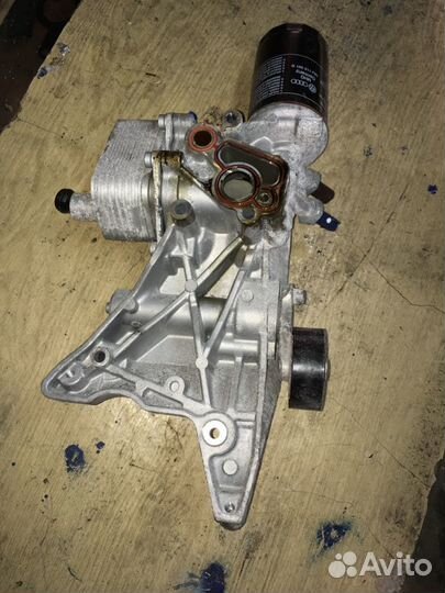 Корпус масляного фильтра 06J903143AH