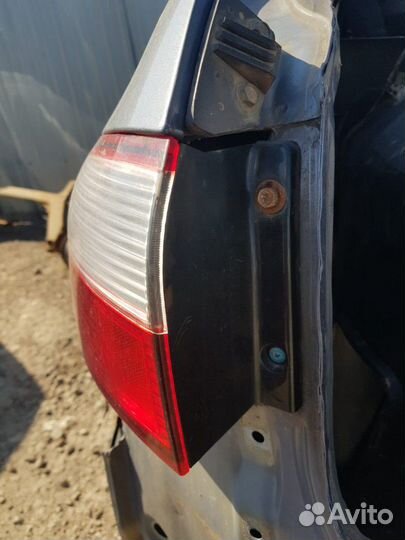 Фонарь левый наружний Шевроле Ланос хэтчбек