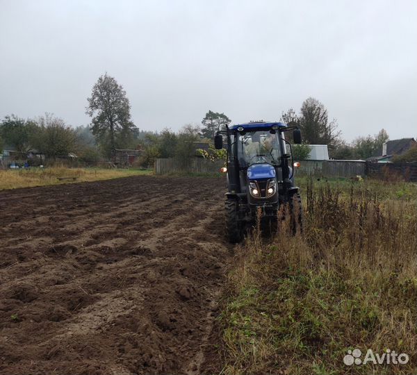 Вспашка земли и целины трактором с плугом, фрезой