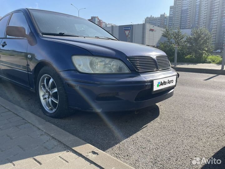 Mitsubishi Lancer 2.0 AT, 2003, битый, 210 000 км