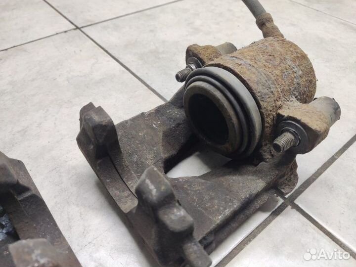 Суппорт тормозной передний Skoda Octavia А5 1.6