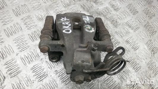 Суппорт тормозной задний левый ford kuga 1 (OKR07M