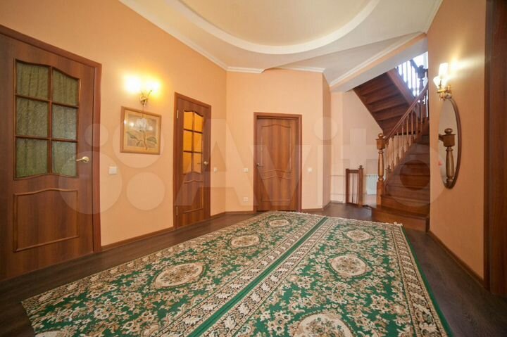 Коттедж 396 м² на участке 8,5 сот.