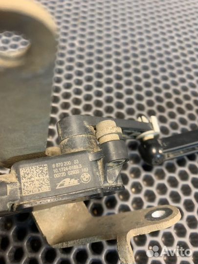 Датчик высоты дорожного просвета задний левый Bmw