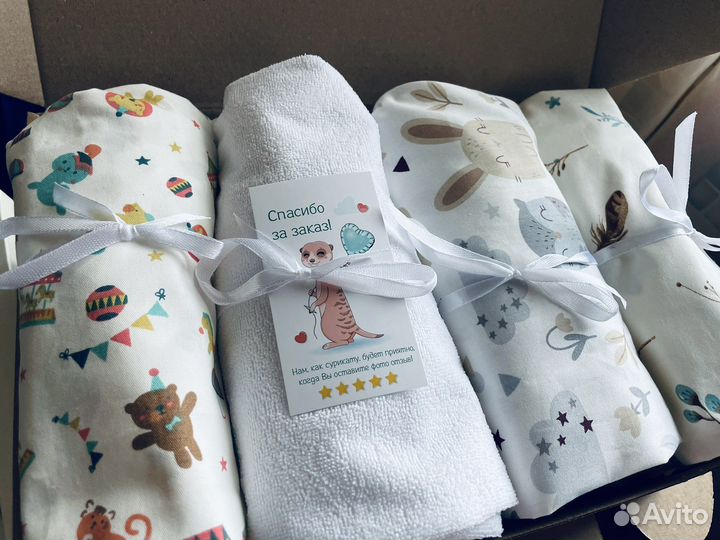 Простыни, наматрасники в приставные кроватки новое