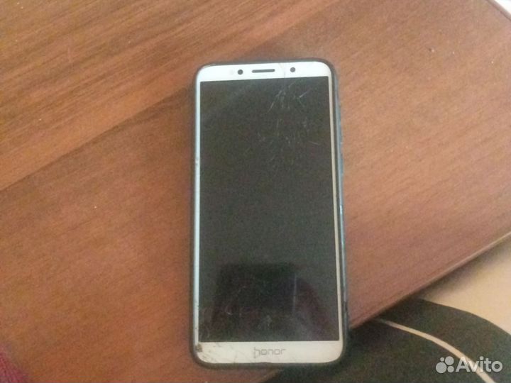Телефон honor 7а