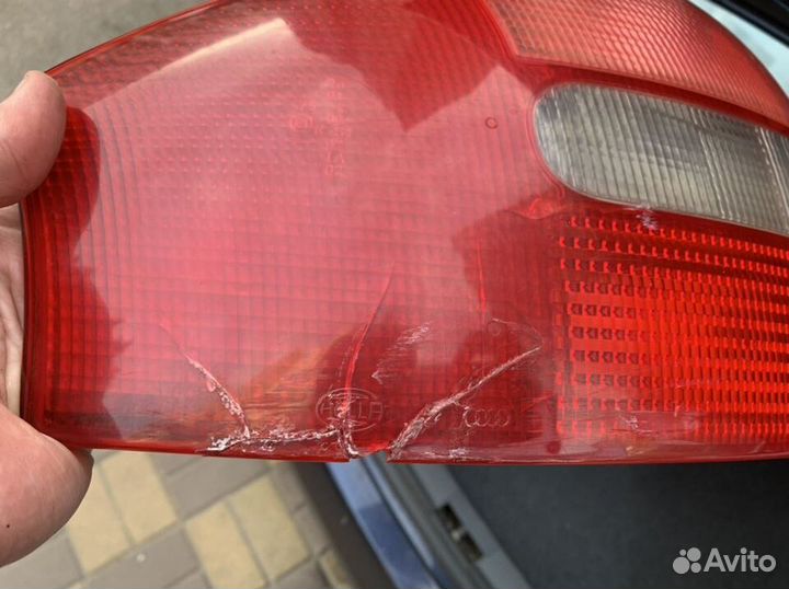 Левый фонарь Hella для Audi A6 c5