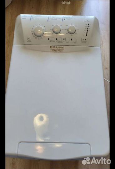 Стиральная машина с вертикальной загрузкой Ariston
