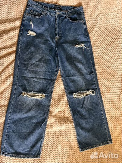 Джинсы голубые широкие рваные 50