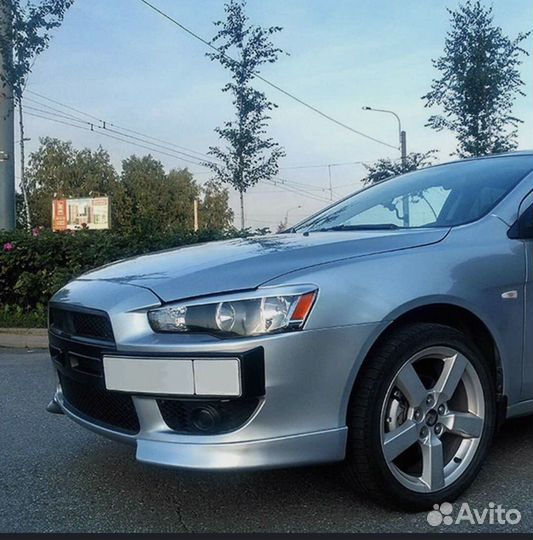 Накладки на передний бампер lancer 10 клыки)