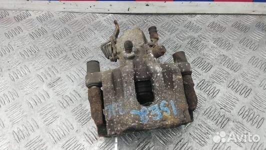 Суппорт тормозной задний левый nissan primera P12