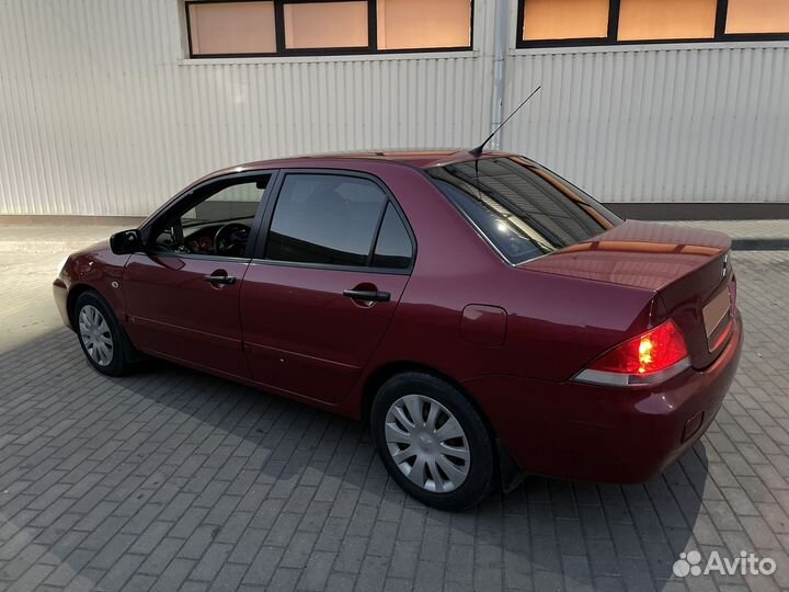 Mitsubishi Lancer 1.3 МТ, 2006, 180 000 км