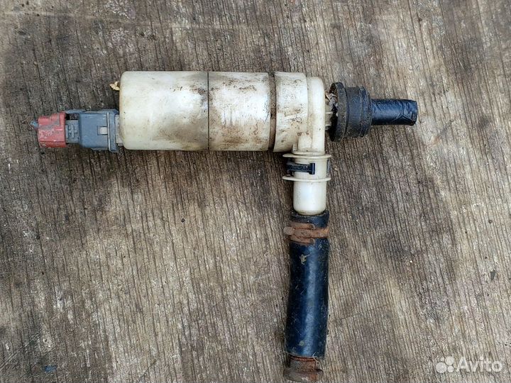 Насос омывателя фар на Ниссан Алмера 2005г