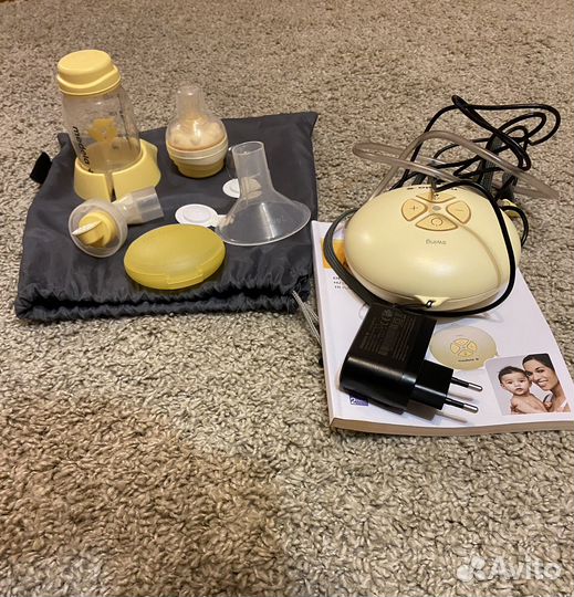 Молокоотсос medela электрический