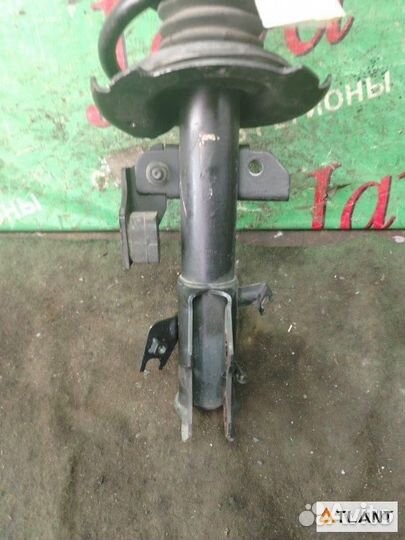 Стойка передняя левая mazda demio
