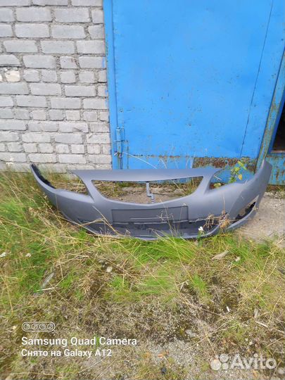 Бампер передний Opel astra j дорестайл