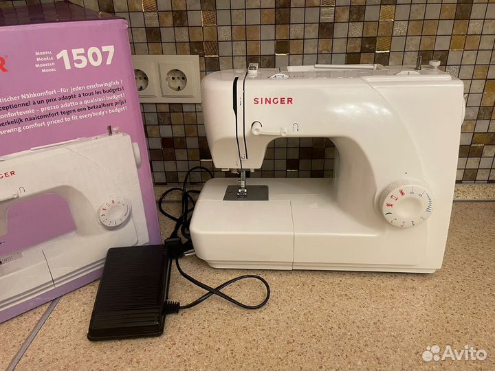 Швейная машина Singer