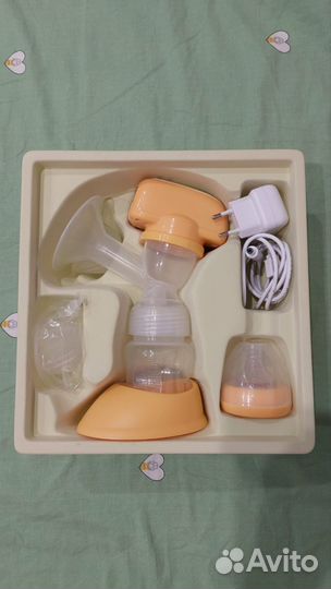 Молокоотсос medela электрический