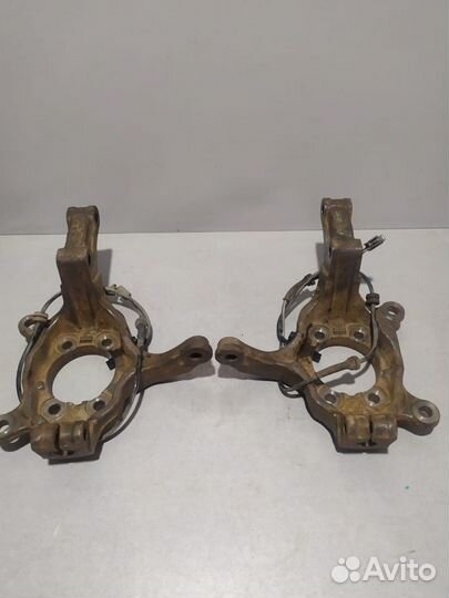 Кулака поворотные передние Nissan Qashqai 2008