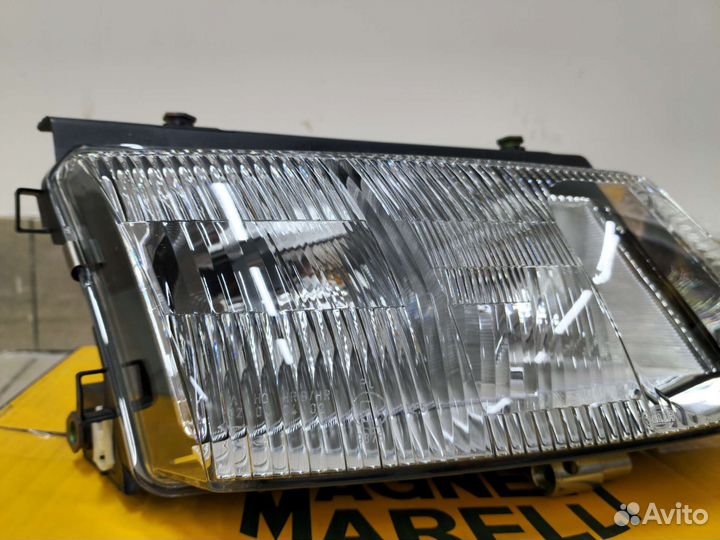 Передняя новая Hella фара VW Passat B5 (Без птф) R