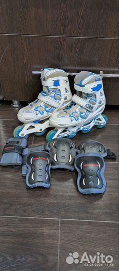 Роликовые коньки