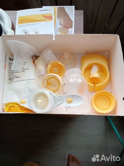 Молокоотсос medela