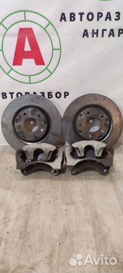 Суппорта и диски передняя Mitsubishi Lancer 10