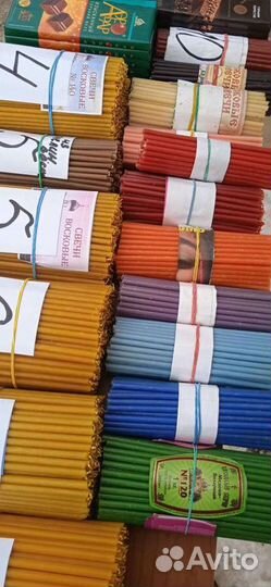 Свечи восковые церковные освещённые